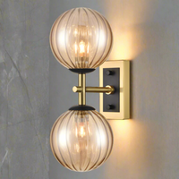 Aged Brass & Matt Black Dual Wall Light With Tinted Ribbed Glass IP 44