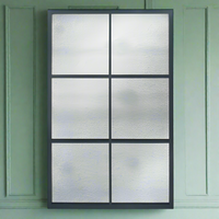 Rectangular, black framed window mirror with six panes and benefiting from an aged glass finish. Creating a airy and spacious impression in any space. This mirror would extend the space in a narrow hall, , give a vintage feel to your kitchen.
H: 110 cm W: 70 cm