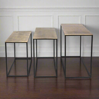 Three different sizes of antique bronze top tables on a metal iron base. A Simple but beautiful clean line.
They can be purchased individually or as a set.