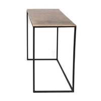 Set of three antique bronze top side tables of varying sizes on a metal iron base, displayed in a room setting.