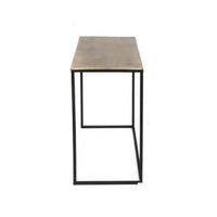 Set of three antique bronze top side tables of varying sizes on a metal iron base, displayed in a room setting.