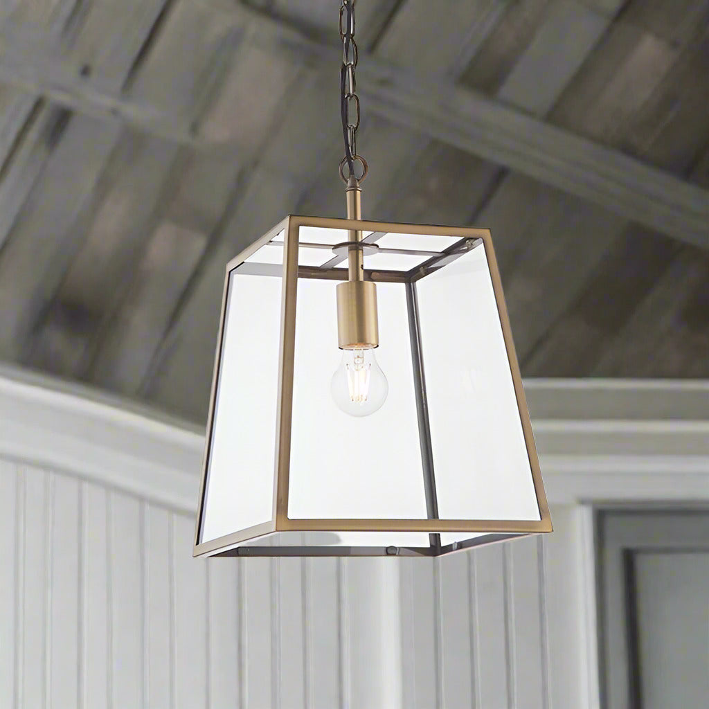 Discover the Antique Brass Lantern Light, ideal for porches or halls. Its elegant design suits any style. Perfect as kitchen island trio lighting.