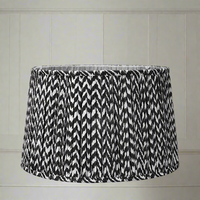 Beautifully patterned black and cream lampshade, pleated in a tapered shape. Pleated, tapered shades to add glamour to your table lights.