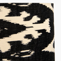 A beautiful black cotton ikat patterned shade. It can be used as a ceiling pendant shade or in a table lamp.