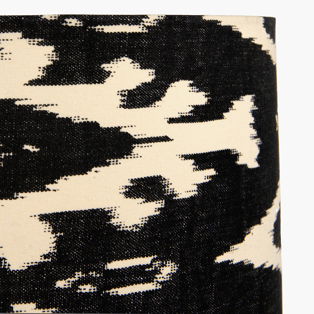 A beautiful black cotton ikat patterned shade. It can be used as a ceiling pendant shade or in a table lamp.
