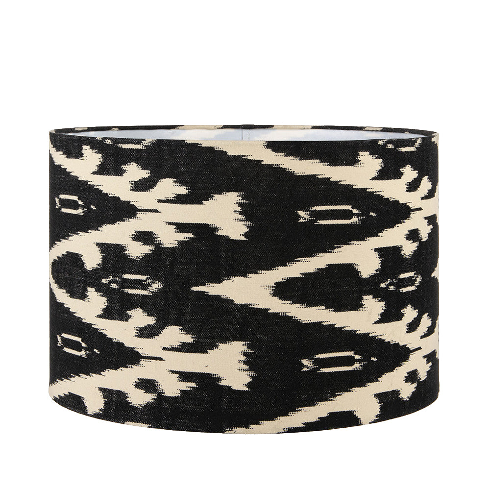 A beautiful black cotton ikat patterned shade. It can be used as a ceiling pendant shade or in a table lamp.