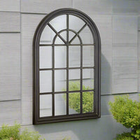 Distressed soft black finished, wooden, arched window mirror. These window mirrors work really well in a patio setting, flashing light into the darkest of areas. 