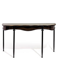 Medium size curved metal console table with pale gilt accents to the rim or the top. The curved metal frame of this black table adds a soft sculptural element.