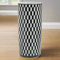 A stunning chequer designed black and white ceramic umbrella stand. A beautiful addition to your hall.
