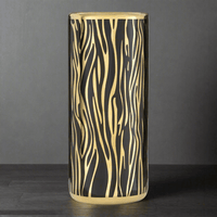 A stunningly patterned ceramic umbrella stand in a black and gold animal stripe. A luxurious addition to your hall, yet practical holding the family umbrellas.  A very glamorous ceramic umbrella holder, the black and gold stripes will really add a touch of luxury to your hall. Ceramic umbrella stands are a perfect way to declutter the entrance to your home, We have a wide range of ceramic umbrella stands on our website in many different colours. Well worth taking a look at our range of ceramic umbrella