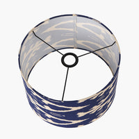 A beautiful dark blue cotton ikat patterned shade. It can be used as a ceiling pendant shade or in a table lamp.
