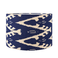 A beautiful dark blue cotton ikat patterned shade. It can be used as a ceiling pendant shade or in a table lamp.
