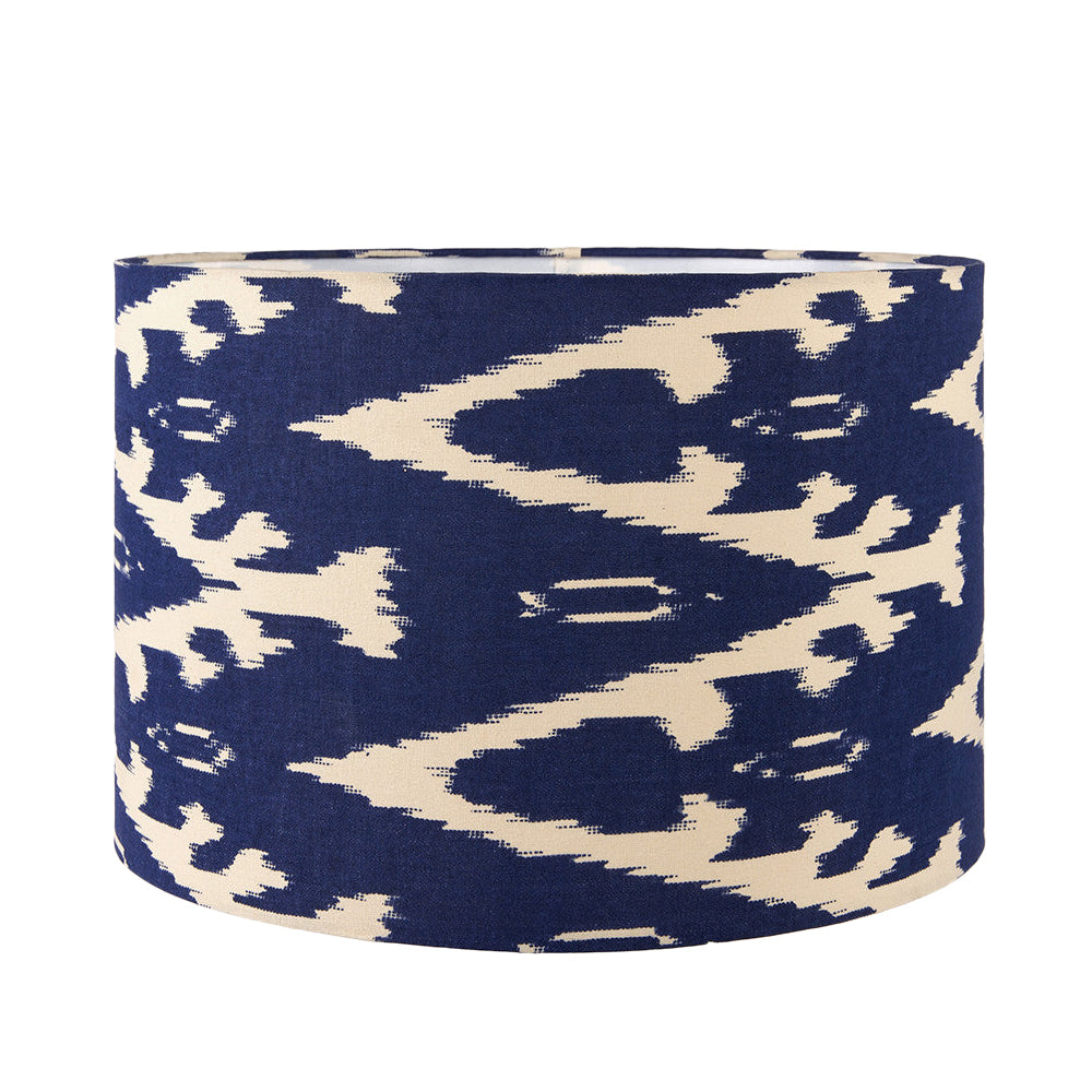 A beautiful dark blue cotton ikat patterned shade. It can be used as a ceiling pendant shade or in a table lamp.