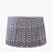 Large, chevron patterned, pleated shade in a blue and cream colouring.