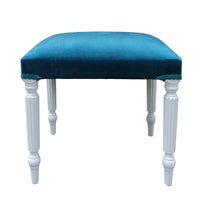 This blue velvet dressing table stool is handmade in our workshop in England from start to finish. It is a luxurious wing back chair with a luxurious shimmer