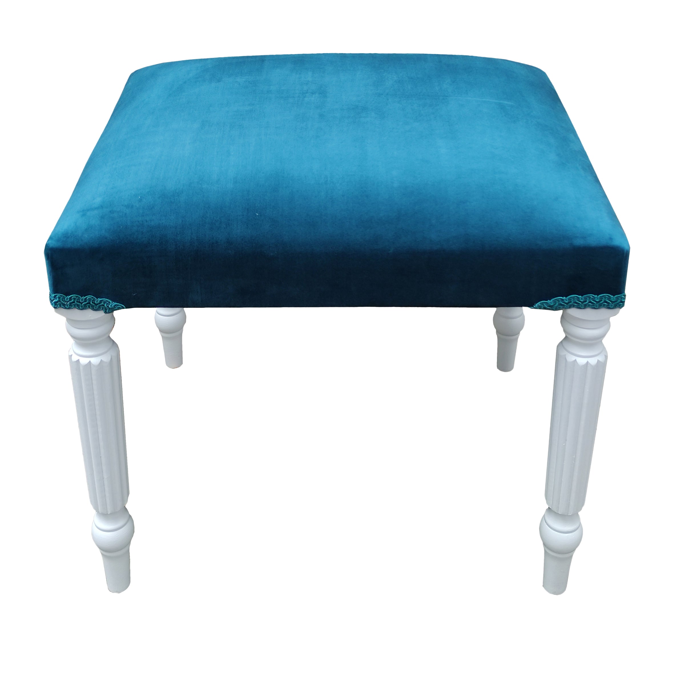 This blue velvet dressing table stool is handmade in our workshop in England from start to finish. It is a luxurious wing back chair with a luxurious shimmer