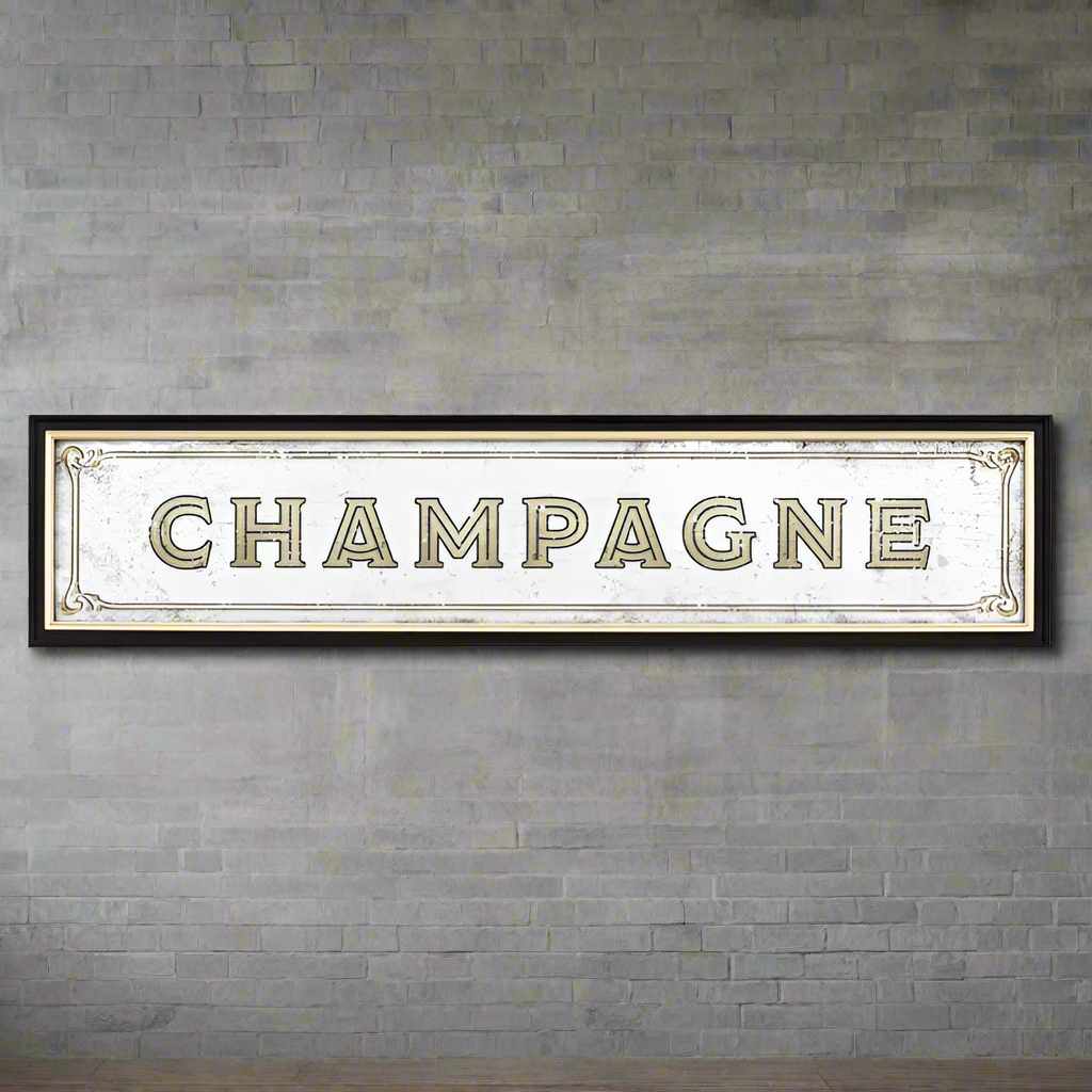 A vintage inspired wall mirrored Sign "champagne" on a black frame. A perfect retro look.