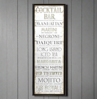 A vintage inspired wall mirrored Sign "Cocktail Bar" on a black frame. A perfect retro look.