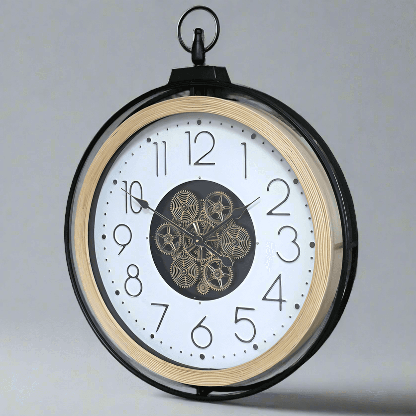 A large moving cog clock with white enameled face and pale wooden surround. The entire cog clock is encased in a iron frame. A statement clock which will enhance any wall