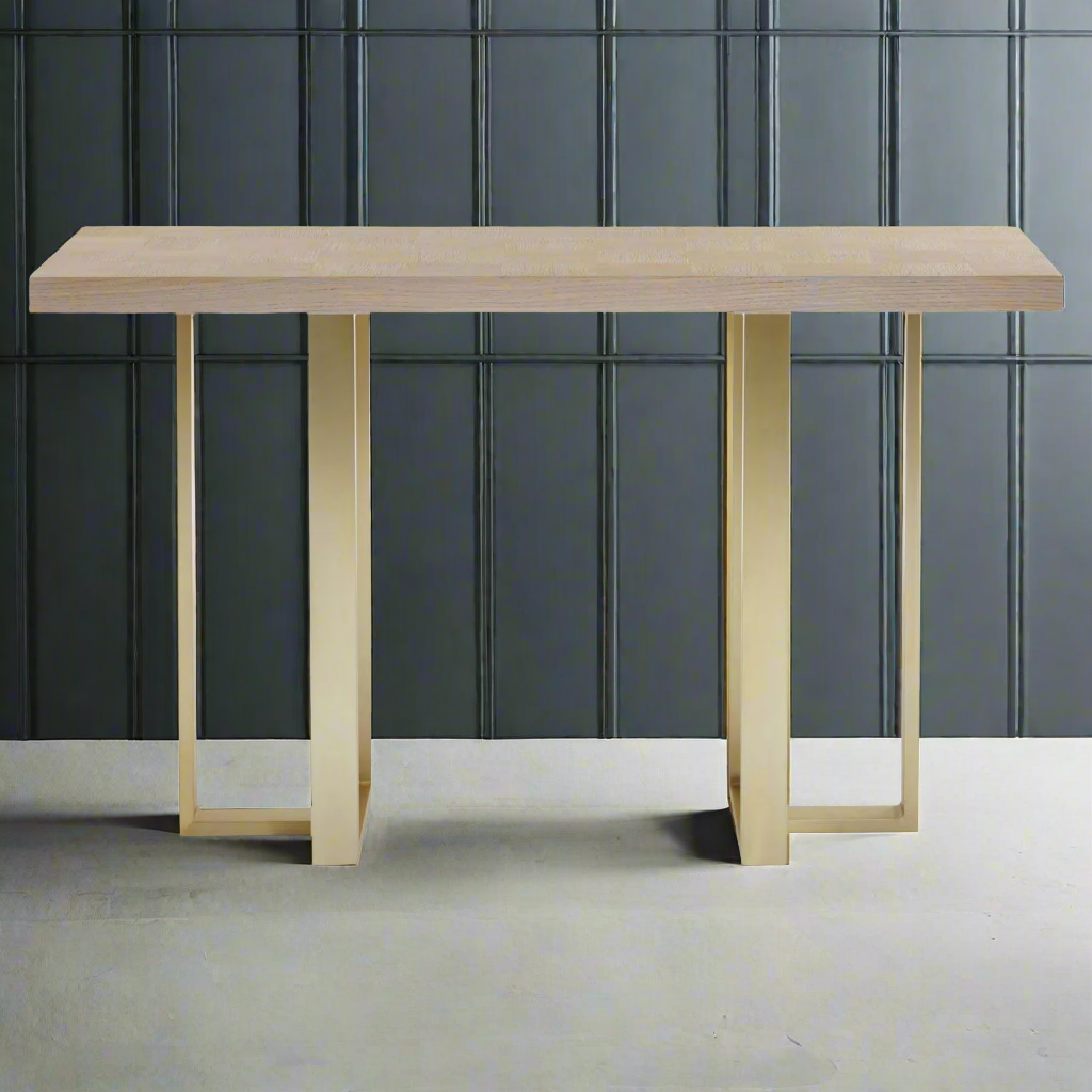 A real statement console table, the mixture of the luxurious pale oak against the contemporary design of the brushed gilt metal legs.  A perfect hall table, narrow enough so as not to intrude  too much, wide enough for a couple of lamps and would look splendid with a large mirror above.