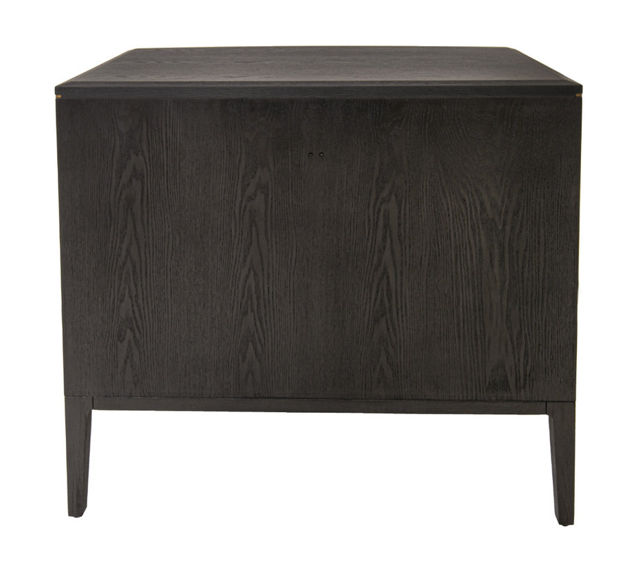 This stylish chest of drawers features a dark grey finish with great wood texture for a unique look. It is complemented by elegant brass handles and brushed gold feet.
It has three deep drawers with plenty of storage. The classic design pairs beautifully with modern and traditional decor, making it perfect for any interior design style adding a touch of luxury to any room.