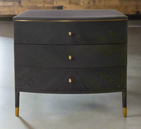 This stylish chest of drawers features a dark grey finish with great wood texture for a unique look. It is complemented by elegant brass handles and brushed gold feet.
It has three deep drawers with plenty of storage. The classic design pairs beautifully with modern and traditional decor, making it perfect for any interior design style adding a touch of luxury to any room.