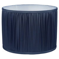 A dark blue pleated shade for a lamp.