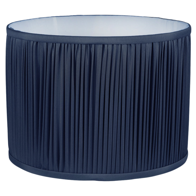 A dark blue pleated shade for a lamp.