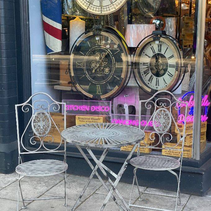 Three piece folding, light grey painted patio set, table and two chairs  with rust detail effect giving this a vintage look. Enjoy garden dining with this patio set.