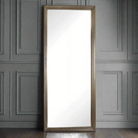 Brushed brass metal framed stepped mirror. Luxurious polished metal frame makes this the ultimate statement mirror.  An absolutely stunning mirror in looks and quality, the beautiful stepping on the gilt metal frame is exceptional.  This mirror is a great leaner in a hall or living area. Alternatively it can be hung vertically or horizontally.