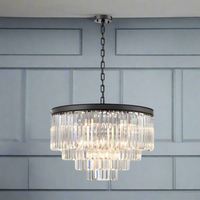 Extra large four tier crystal prism chandelier, beautiful crystal fixture and the black band gives it a contemporary feel. Great over a dining table, would work well in an open kitchen diner.
W: 65 cm Min Drop: 67 cm  Max Drop: 245 cm