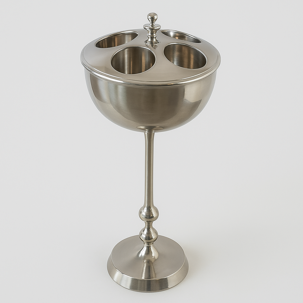 This elegant floor-standing wine cooler holds up to four bottles, keeping your favourite wines perfectly chilled and within easy reach. Crafted from durable nickel with a sleek polished finish, it features a stable pedestal base and removable top for easy serving. Ideal for home bars, dining rooms, or entertaining spaces, this 4-bottle wine cooler combines functionality with timeless style - a perfect addition for any wine enthusiast. A luxurious accessory for your dining table.
