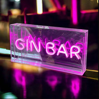 Acrylic neon wall sign "Gin Bar" on a box frame. A perfect retro look.
It comes with an USB cable with dimmer switch.