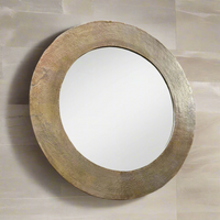Hammered brass metal framed mirror. A great, statement circular mirror with a metal frame.  Deep metal frame in gold adds to the glamour of this exceptional mirror.