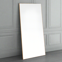 A simple and highly effective mirror minimalist in design yet maximum in impact.  With a super slim wooden gold frame that is 2cm in depth, the striking thing about this mirror is the sheer volume of glass that reflects and bounces light back into your room.  Made in the UK, this mirror is worth the wait.  Also available in black.