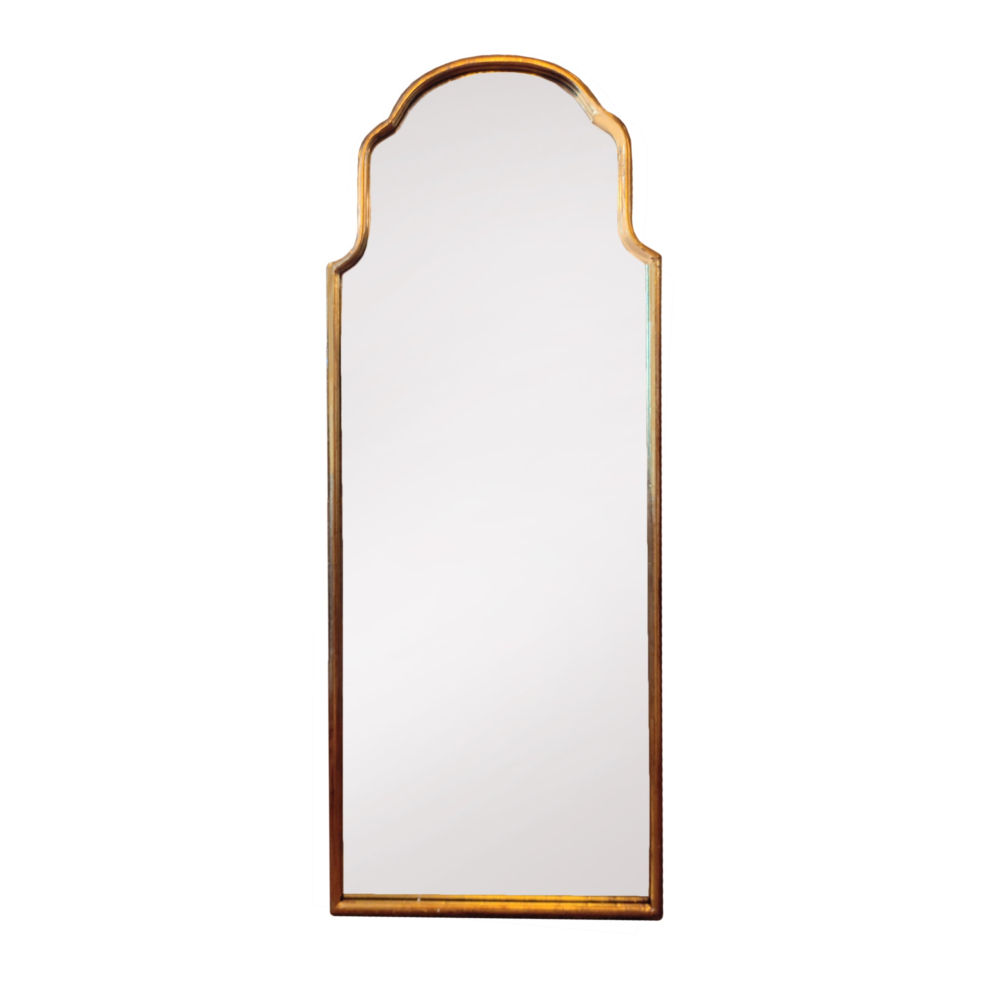 Arched Metal Shaped Gilt Mirror. Pretty rounded shaping to the top of this long mirror adds interest and style.  Perfect in a dressing room, bedroom, or at the end of a long hall to add light and perspective to your space.