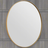 Slim framed gold oval mirror, a sophisticated look in the cloakroom or bathroom.  The glass of the mirror is recessed into the gilt frame to show a lot of mirror, perfect to enhance a dark corner.
H: 60 cm W: 50 cm D: 4 cm