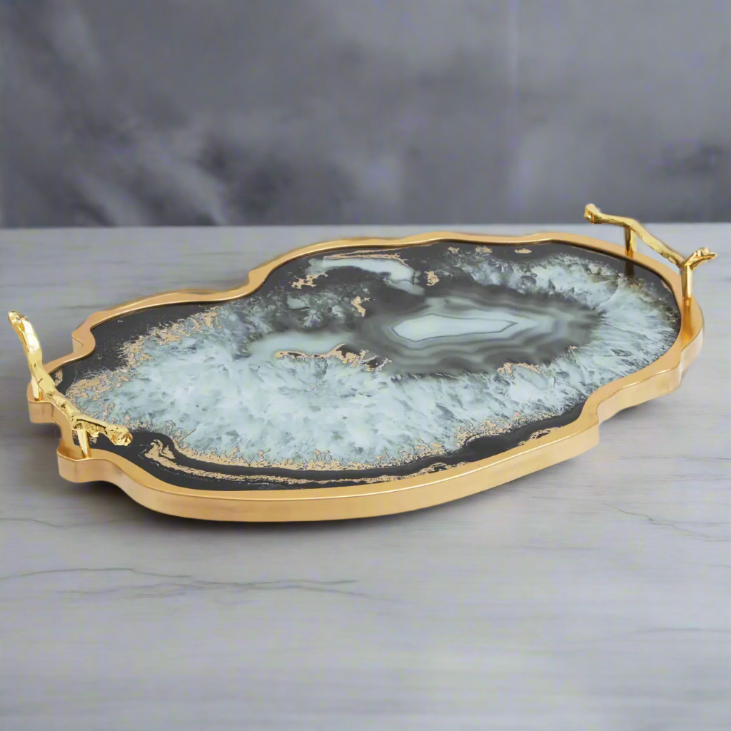 An absolutely stunning agate tray in a black and azure blue colour set in a brushed gold border with gilt styled handles. A perfect gift for the home that has everything.   A touch of luxury on your table or as a luxurious gift !!