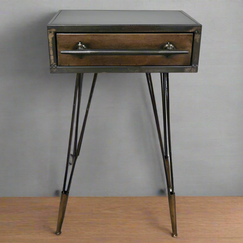 Industrial style metal bedside table with a single drawer, brown wooden tabletop, and slim metal legs.