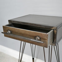 Industrial style metal bedside table with one drawer.  A simple, easy bedside table, perfect for a guest or child's bedroom, with an industrial twist and great size for bedside lamp,