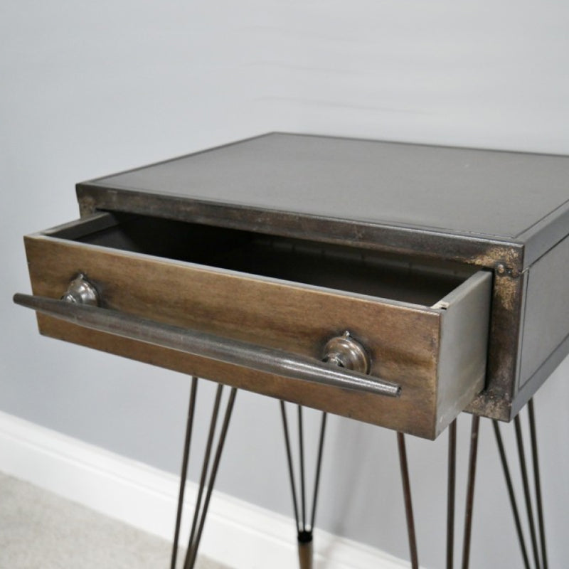 Industrial style metal bedside table with one drawer.  A simple, easy bedside table, perfect for a guest or child's bedroom, with an industrial twist and great size for bedside lamp,