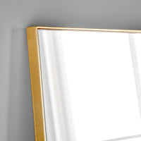 A simple and highly effective mirror minimalist in design yet maximum in impact.  With a super slim wooden gold frame that is 2cm in depth, the striking thing about this mirror is the sheer volume of glass that reflects and bounces light back into your room.  Made in the UK, this mirror is worth the wait.  Also available in black.   H: 180 cm W: 90 cm D: 2 cm  Weight: 26 kg