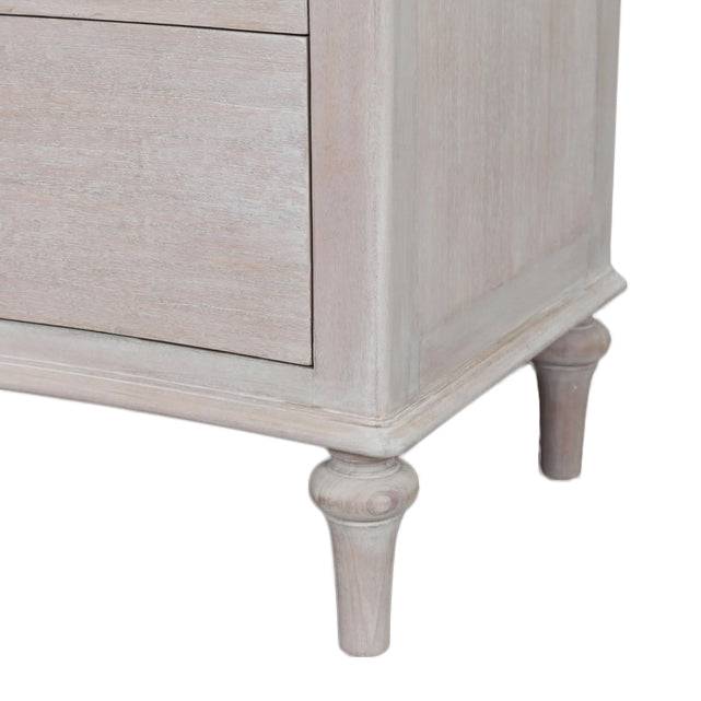 A Beautiful six drawer chest. This is a very pretty hardwood piece made from Mindi wood, finished in an ash lime wash veneer finish.