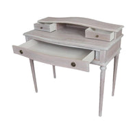 A period style bureau desk in a pale limewashed finish. Four slender turned legs for a classic and refined look. Explore our website for desks and other period furniture.