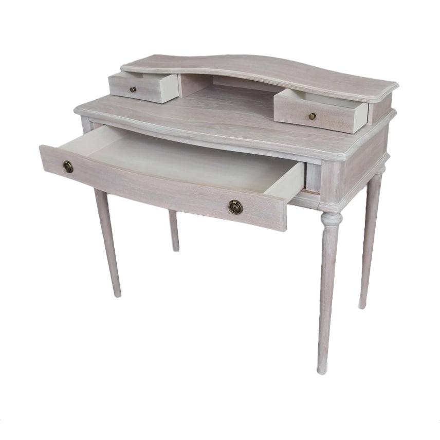 A period style bureau desk in a pale limewashed finish. Four slender turned legs for a classic and refined look. Explore our website for desks and other period furniture.