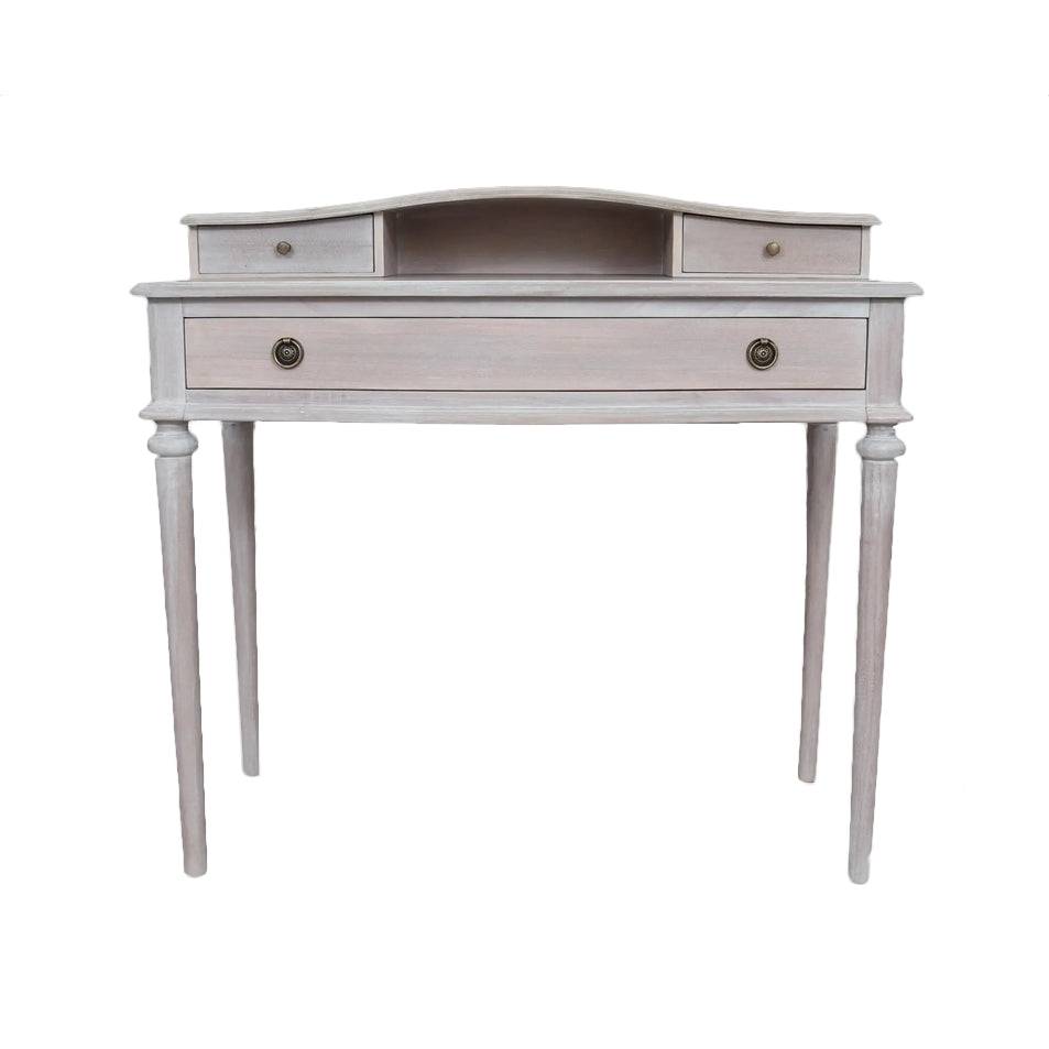 A period style bureau desk in a pale limewashed finish. Four slender turned legs for a classic and refined look. Explore our website for desks and other period furniture.