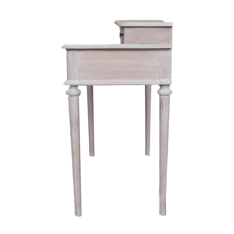 A period style bureau desk in a pale limewashed finish. Four slender turned legs for a classic and refined look. Explore our website for desks and other period furniture.