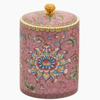 Handcrafted ceramic candle jar with ornate floral details and gold accents, scented with Mandarin and Matcha.