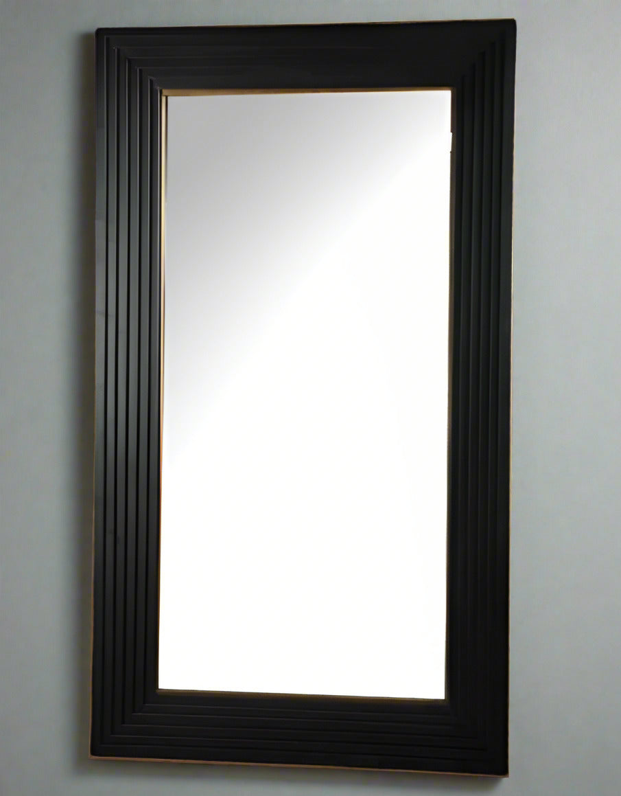 Large black metal  framed mirror with a gilt inner to the frame .  A particularly large black metal mirror, perfect in an urban or industrial interior, but would not look out of place in a period town home or classic country house. Black  mirrors of this size are dramatic and elegant in any room, adding a stylish, contemporary feel.  Would work well in any room, large black wooden mirror in the hall to add light and perspective, in a living or dining room for a dramatic effect.