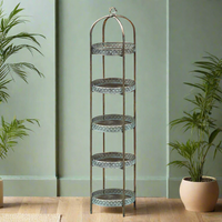 A unique and very pretty shelf unit with pierced metal detailing around shelves that can be lifted out and also used as trays.  Finished in a rustic antique gold, this furniture piece has Moroccan vibes with five shelves encased in an outer frame that can fold flat.  
This is a useful storage solution for rooms that need decluttering. Can be used in any space and looks particularly glamorous in bathrooms and conservatories. 